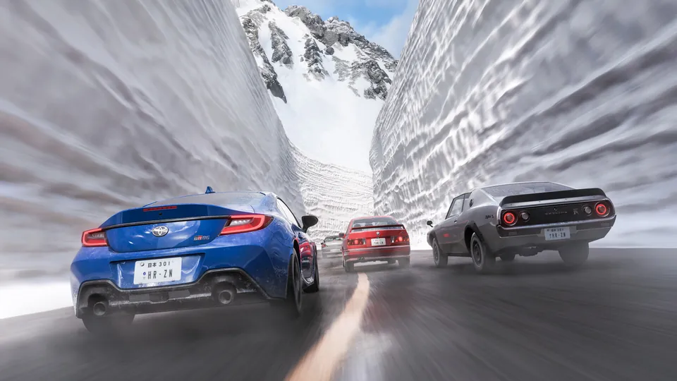 Three cars race down a snow-walled mountain road in Forza Horizon 6