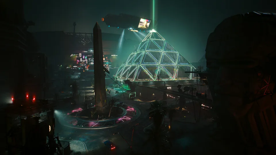 Dogtown at night in Phantom Liberty, with a glowing glass pyramid, an obelisk and an aerial vehicle overhead
