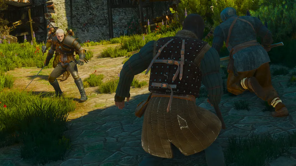 Geralt faces two armed bandits on a grassy village road
