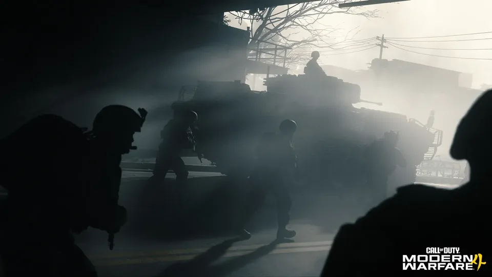 Soldiers in silhouette move past a tank on a foggy street in the Modern Warfare 4 campaign