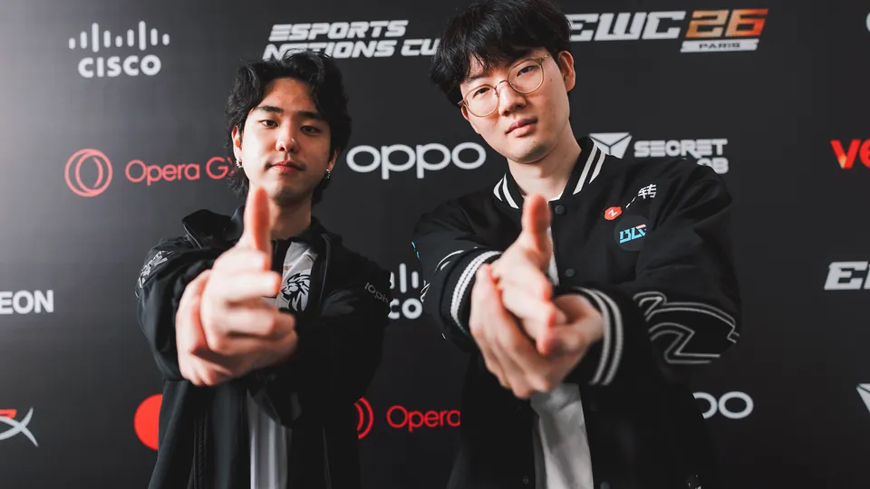 Two Bilibili Gaming players pose with finger guns at the media wall during MSI 2026 in Daejeon