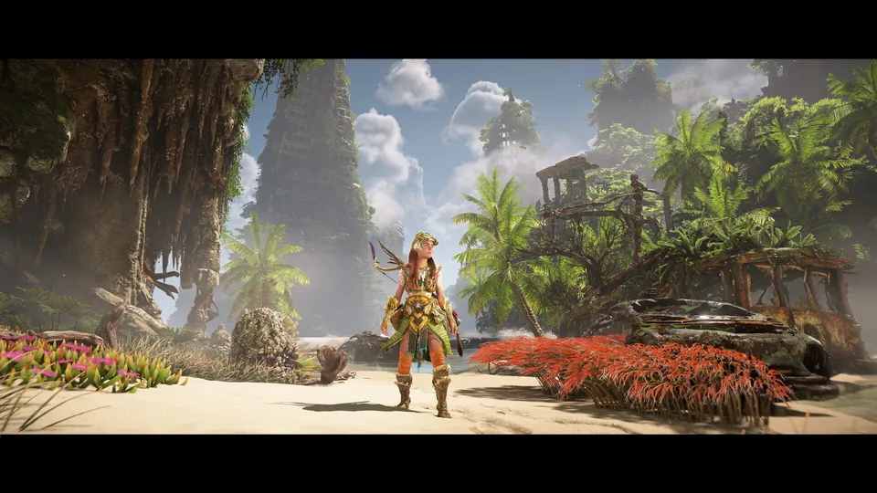 Aloy stands on a sunny beach with palm trees and the overgrown ruins of an old city behind in Horizon Forbidden West