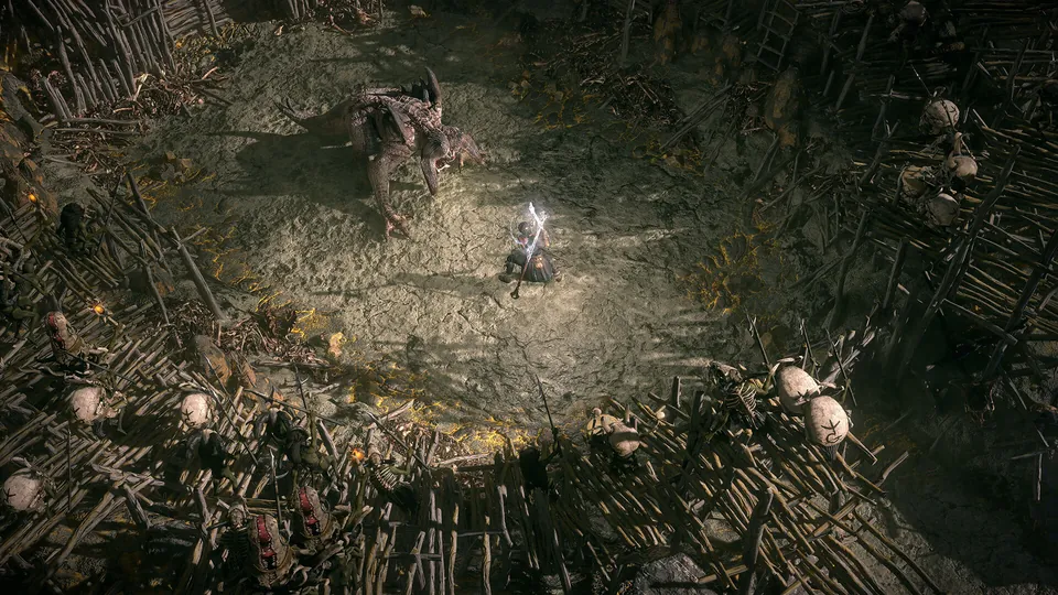 A lone fighter faces a hulking beast in an arena ringed with sharpened stakes in Path of Exile 2