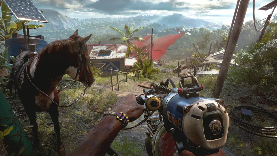 A first-person view of a homemade weapon beside a horse on a hillside village in Far Cry 6
