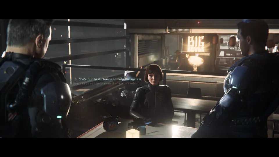 Three navy crew members talk at a table in a dim bar aboard a ship in Squadron 42