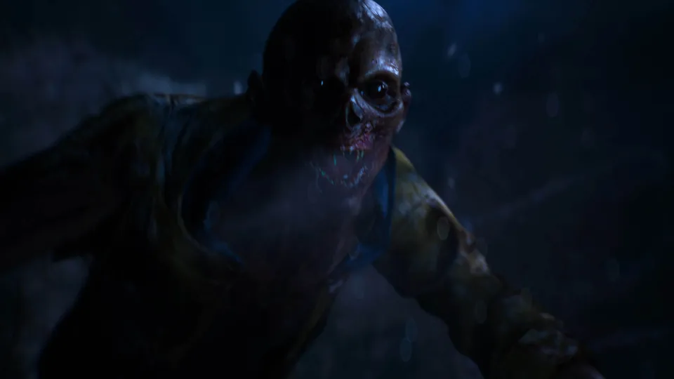 A decayed, ghoulish creature lunges out of the dark in Until Dawn 2