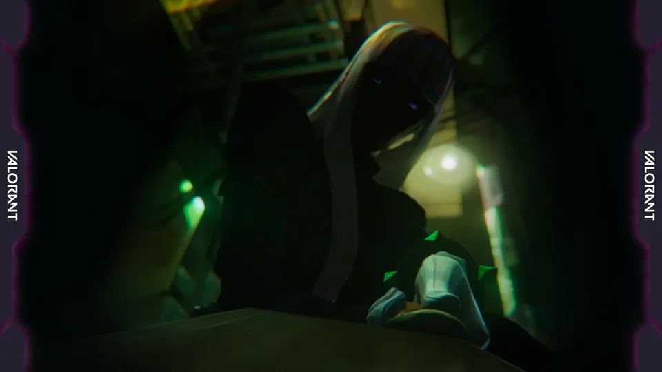 A hooded figure in green light from Riot's Final Word teaser for the new Valorant agent