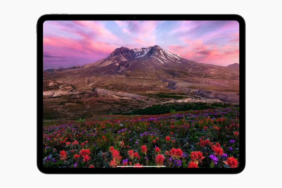 iPad Pro with M4 showing a mountain landscape on its tandem OLED Ultra Retina XDR display