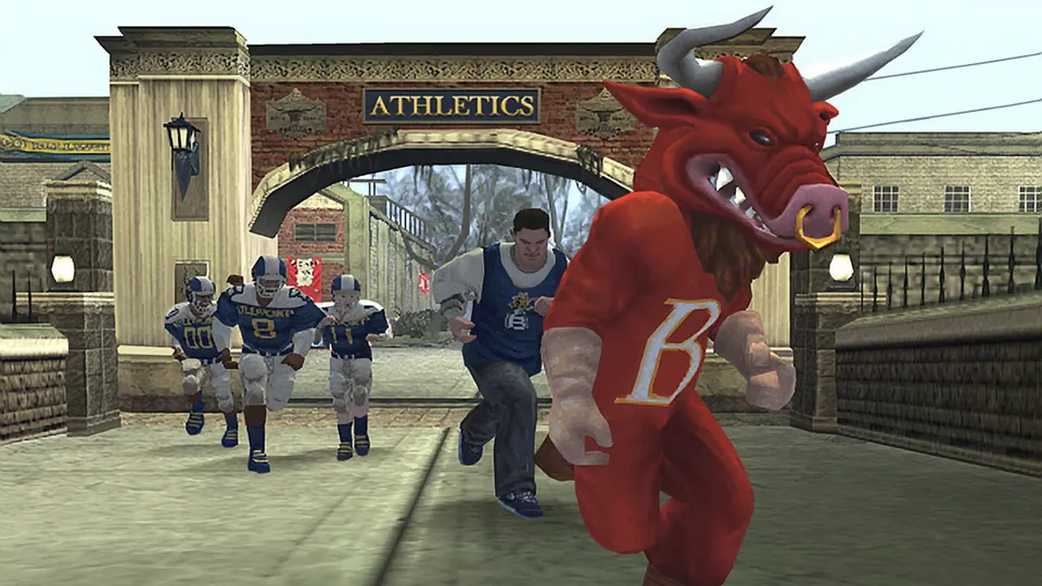 A football team runs through the Athletics gate behind a red bull mascot in Bully