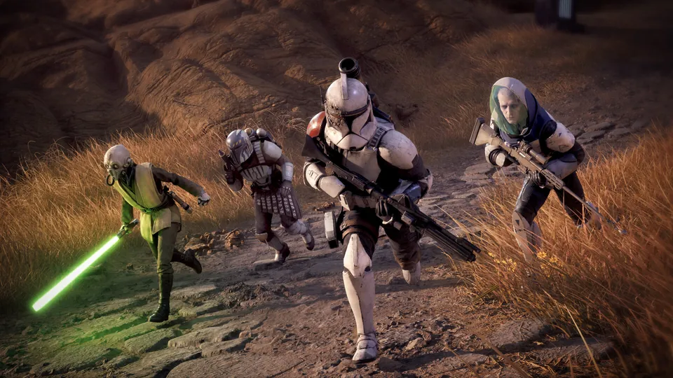 A clone trooper, a fighter with a green lightsaber and two other squad members charge across a grassy hillside in Star Wars Zero Company
