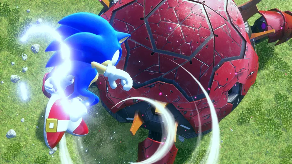 Sonic spins around a giant red armored enemy on a grassy field in Sonic Frontiers on Nintendo Switch 2.