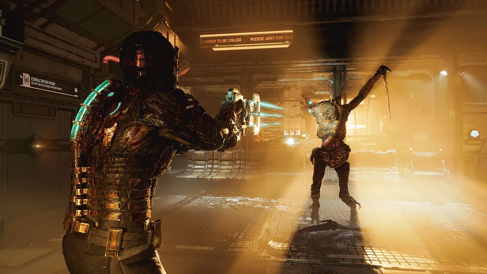 Isaac Clarke aims a plasma cutter at a necromorph in an orange-lit corridor in the Dead Space remake