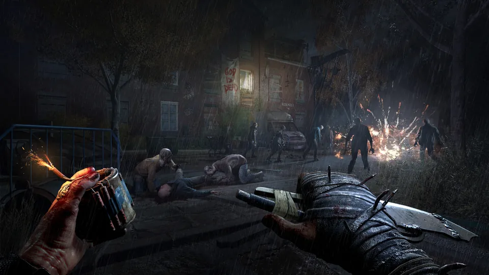 First-person view of a lit explosive in one hand and a blade in the other, with infected and flames on a ruined street at night.