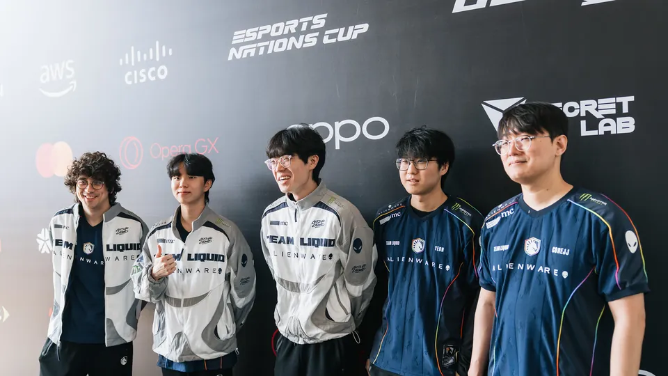 Team Liquid Alienware players, with Yeon and CoreJJ in team jerseys, at the media wall of the MSI 2026 Play-In in Daejeon