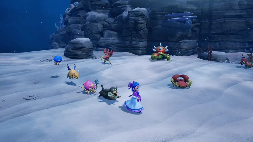 Nera walks across a snowy plain followed by a group of colorful monsters in Dragon Quest Monsters: The Withered World