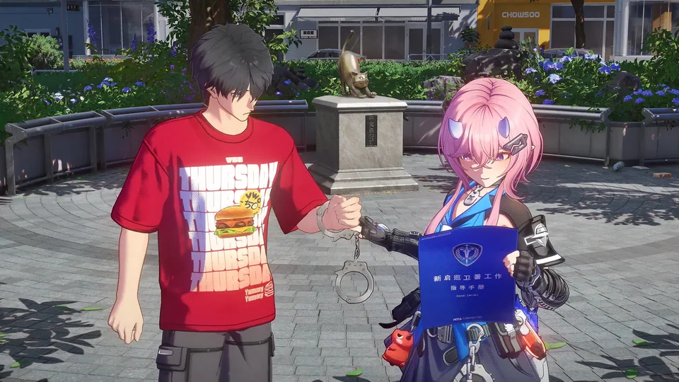 Two characters stand by a statue in a city square, one holding handcuffs, in Ananta