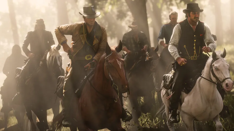Arthur Morgan and members of the Van der Linde gang gallop on horseback through a sunlit, dusty forest in Red Dead Redemption 2