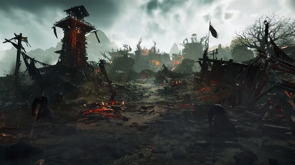 A ruined fortress camp with a burned watchtower under a stormy sky in Wo Long 2