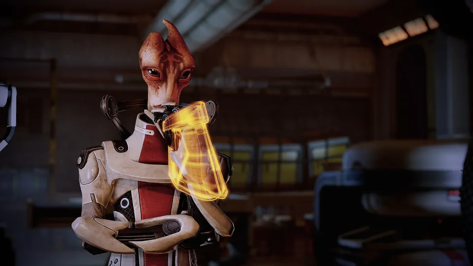 Mordin Solus, the salarian scientist, holding a glowing tool in a lab in Mass Effect Legendary Edition