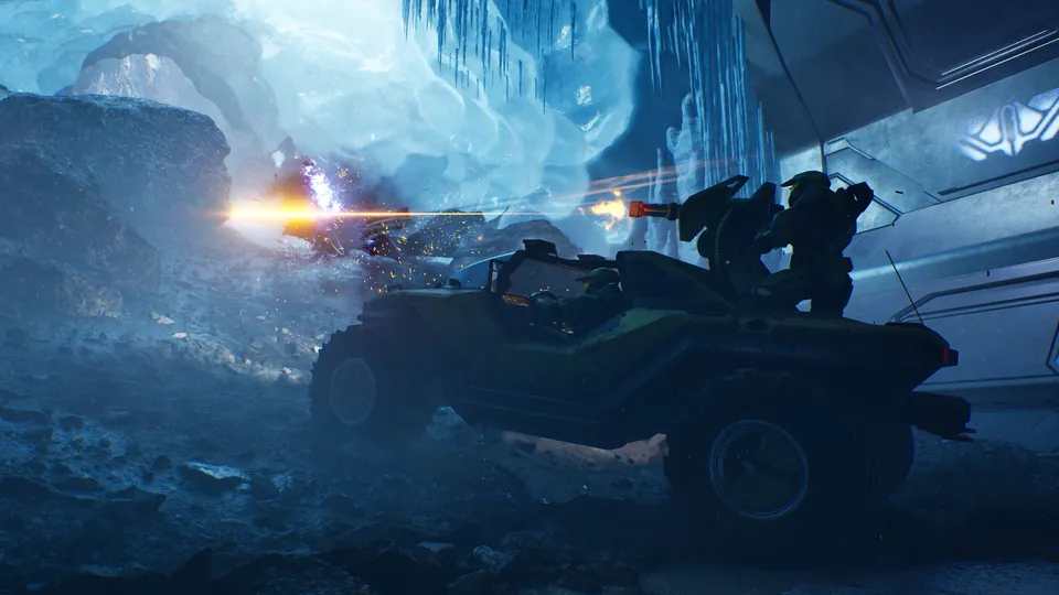 A Warthog fires its turret inside an icy cavern in Halo: Campaign Evolved