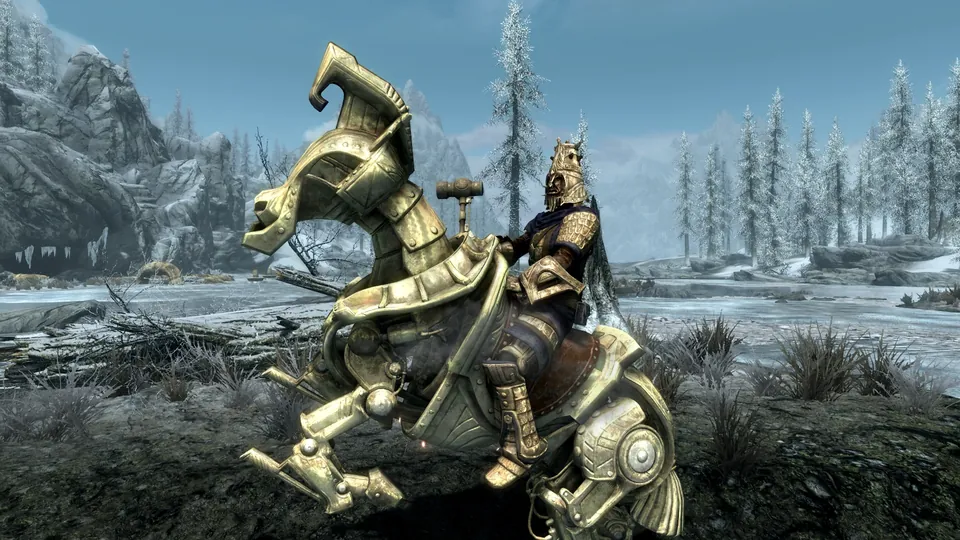 An armored rider sits on a golden mechanical horse in a snowy valley in Skyrim Anniversary Edition on Nintendo Switch 2