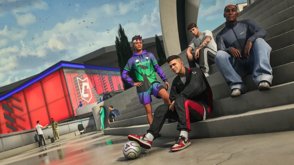 Players in streetwear hang out on concrete steps next to a stadium in The Grounds