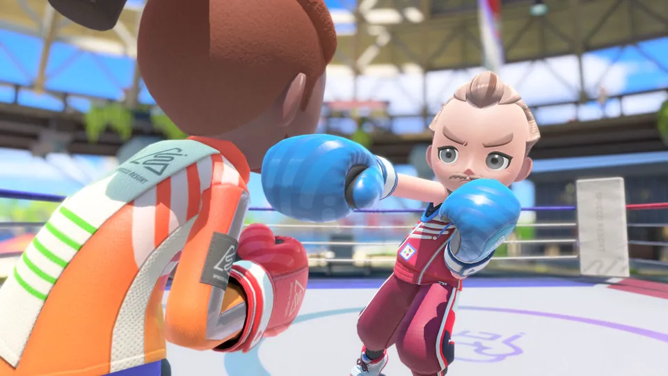 Two Sportsmates in boxing gloves square off in a ring in Nintendo Switch Sports Resort