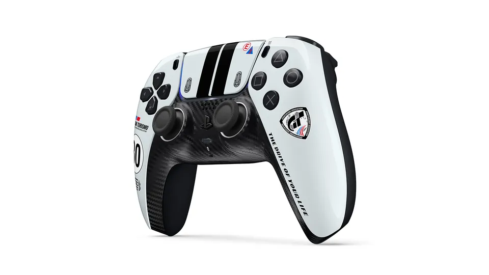 The Gran Turismo Limited Edition DualSense at an angle, showing the black racing stripes and carbon fiber-style grips