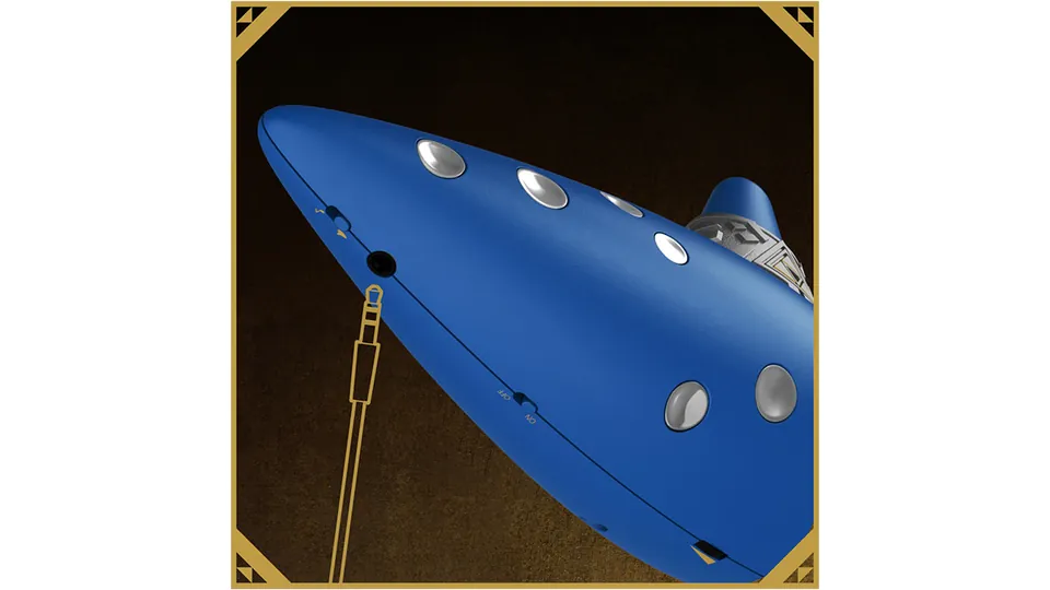 The underside of the Electric Ocarina of Time with a headphone cable plugged into its jack.