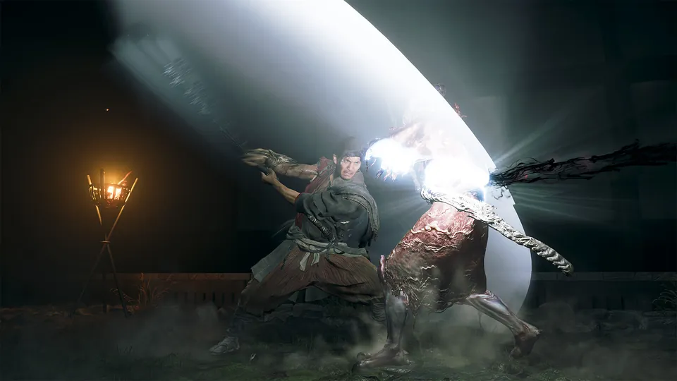 Musashi clashes swords with an enemy in a burst of white light beside a torch in Onimusha: Way of the Sword