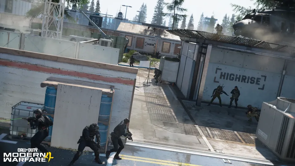 A squad moves along a wall toward a Highrise sign as a helicopter hovers in Modern Warfare 4 multiplayer