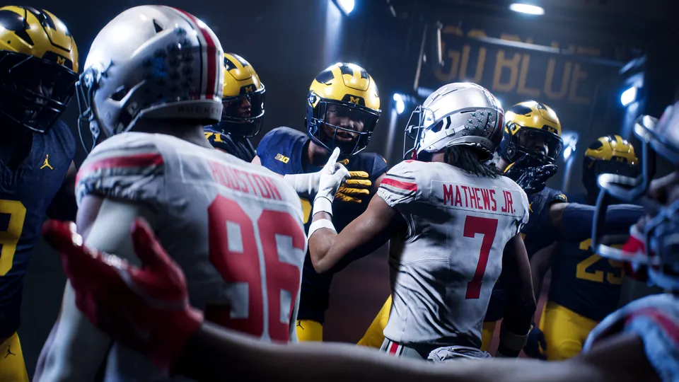 Ohio State and Michigan players face off in a stadium tunnel in College Football 27