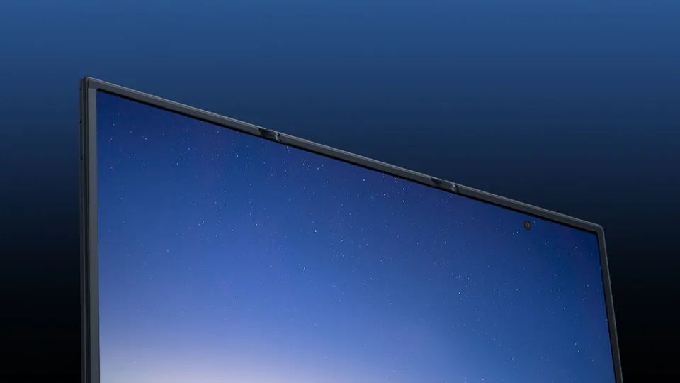 The unfolded Galaxy Z TriFold showing a dusk landscape over water on its 10-inch screen
