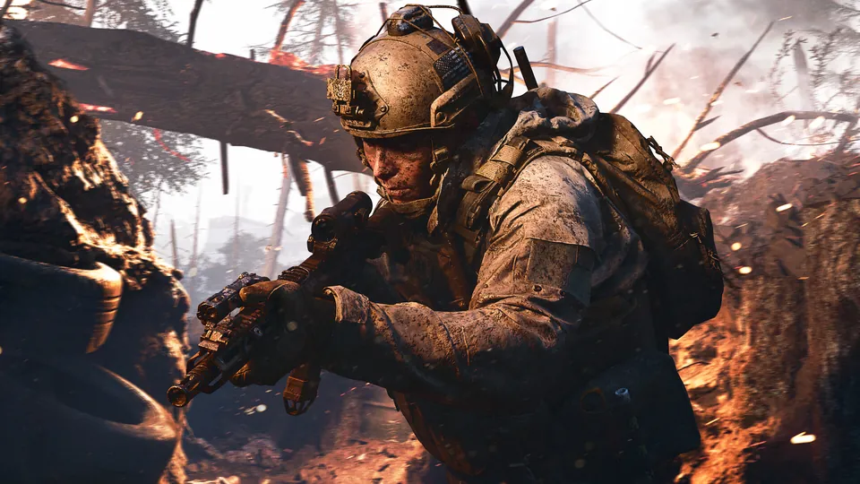 Soldier in a muddy helmet moving through a burning trench with a rifle in Call of Duty: Modern Warfare 4