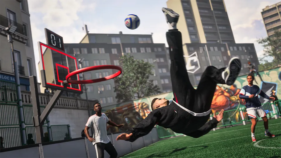A player in a black tracksuit hits a bicycle kick on a street pitch next to a basketball hoop in The Grounds