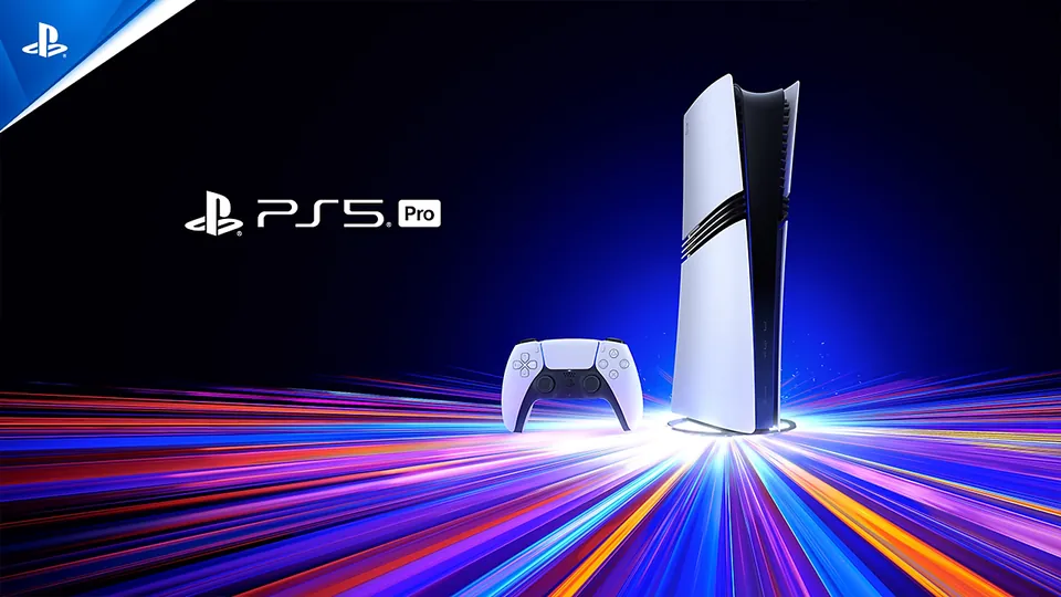 The white PS5 Pro console stands upright next to a DualSense controller in front of streaks of colored light.