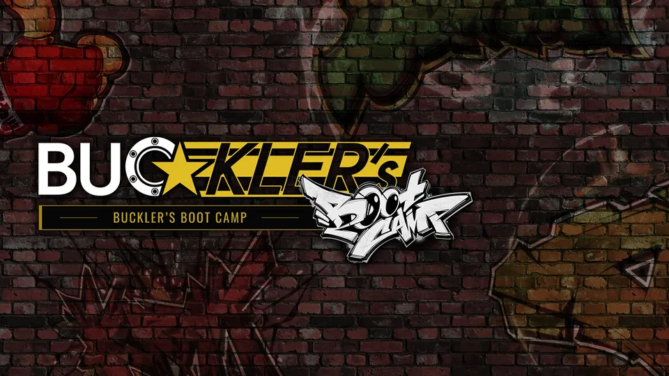 Buckler's Boot Camp logo for Street Fighter 6 on a graffiti brick wall