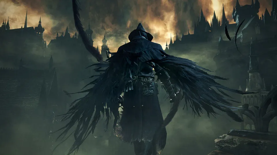 A figure in a feathered cloak stands against a burning city skyline in Bloodborne