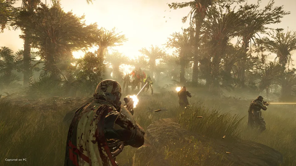 Helldivers 2 screenshot: a squad fires at enemies in a sunlit jungle