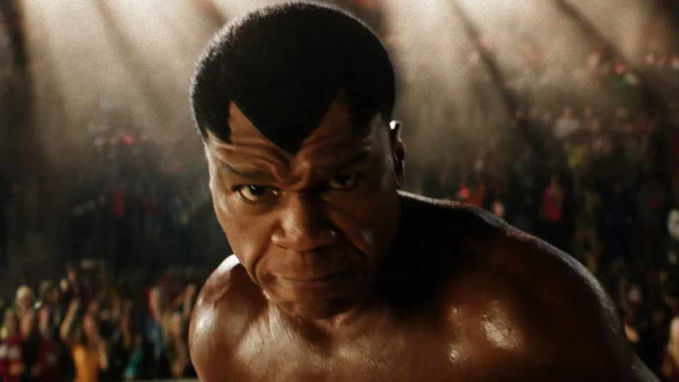 Curtis "50 Cent" Jackson as Balrog, shirtless in a packed tournament arena, in a still from the Street Fighter movie
