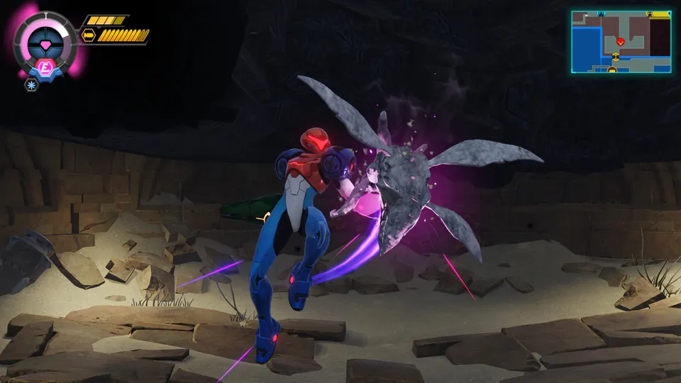 Samus fights a winged creature in a sandy cavern