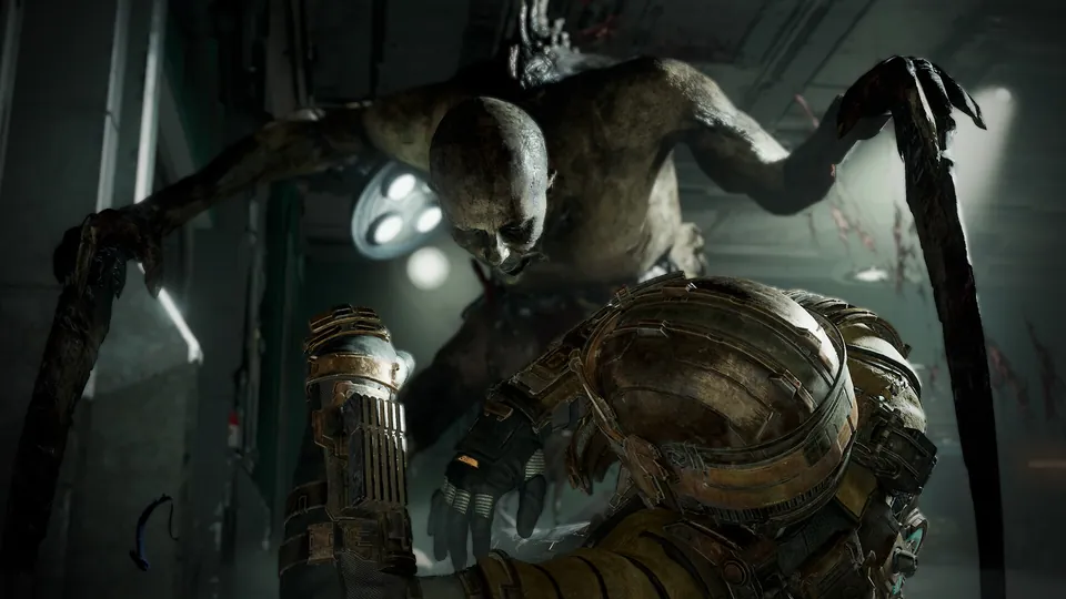 A necromorph with blade arms lunges at Isaac Clarke in the Dead Space remake