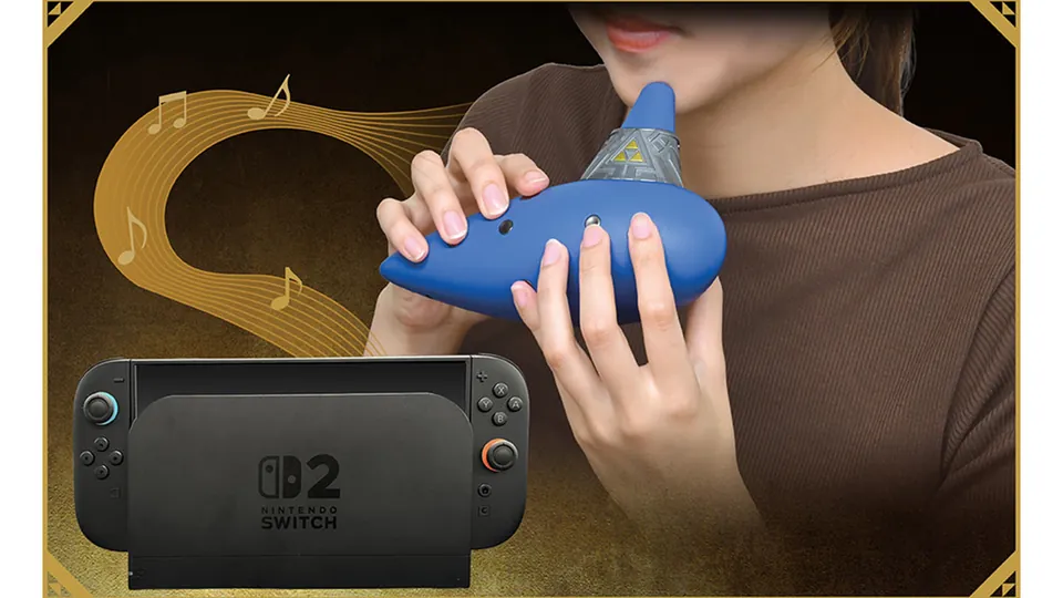 A player presses the finger buttons on the Electric Ocarina of Time next to a docked Switch 2.