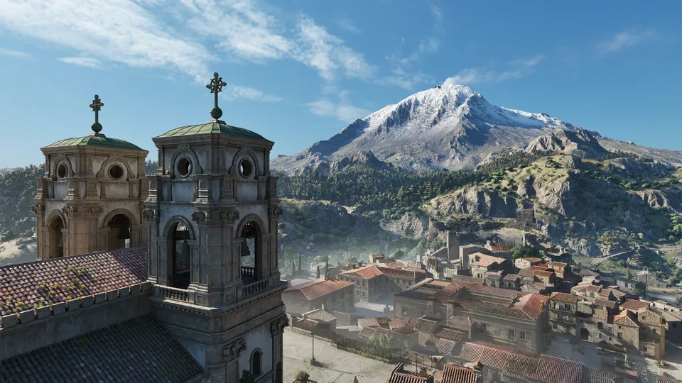 A Sicilian town with church bell towers spreads below a snow-capped mountain under a blue sky