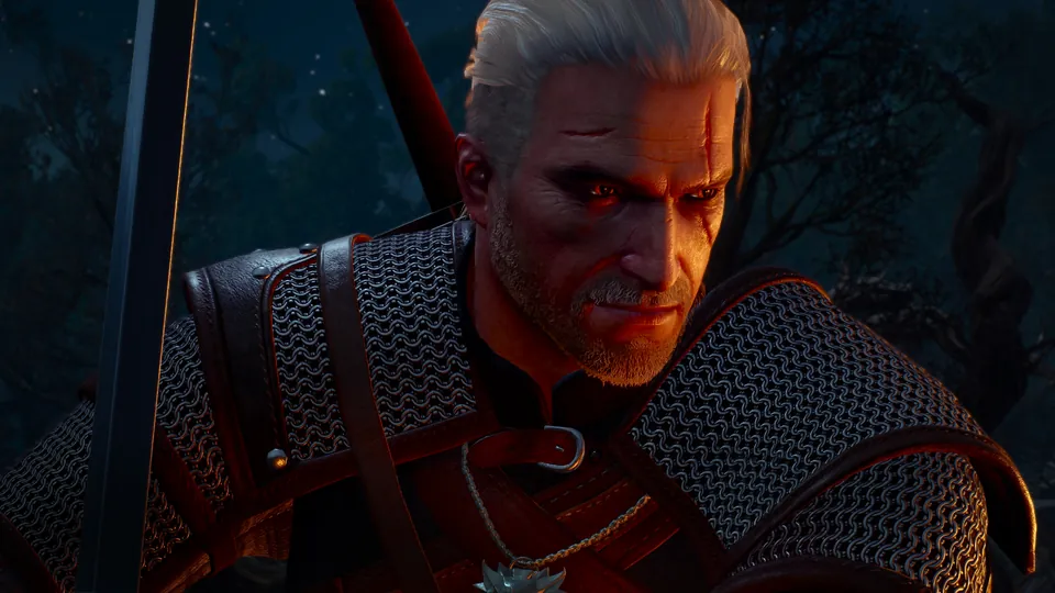 Close-up of Geralt of Rivia in red armor with glowing eyes in The Witcher 3: Songs of the Past