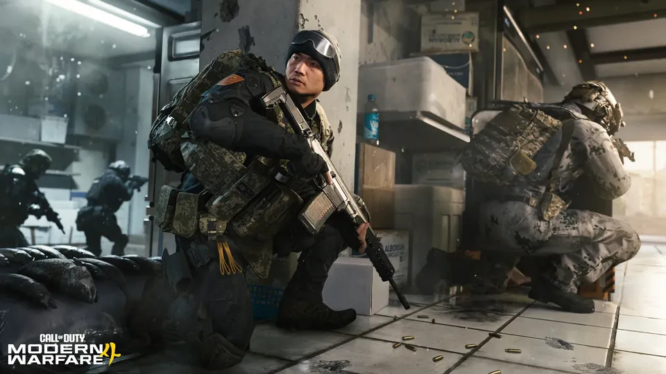 A soldier crouches with a rifle behind boxes in a tiled room in Modern Warfare 4 multiplayer