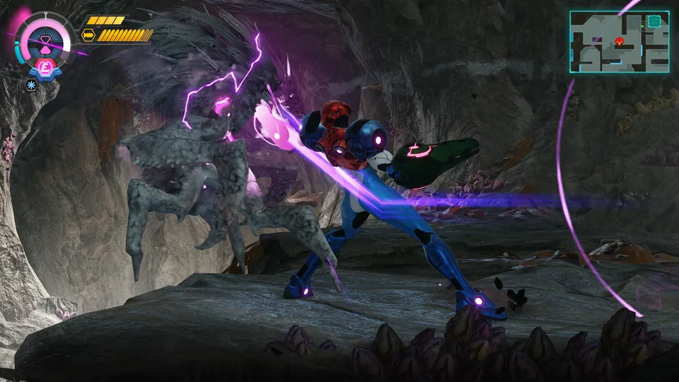 Samus slashes a cave creature with a purple energy attack in a rocky cavern in Metroid Ravenous