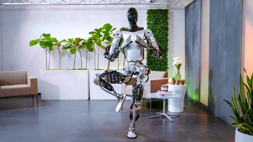 Tesla's Optimus humanoid robot balancing on one leg in a yoga pose in a studio with plants