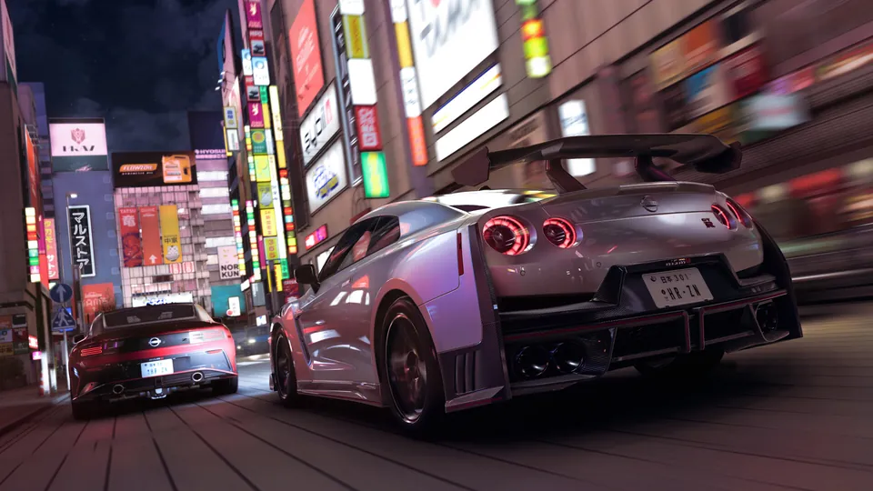 A Nissan GT-R races through neon-lit Tokyo streets at night in Forza Horizon 6