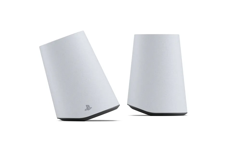 Two white Pulse Elevate speakers, the left one tilted on its angled base and the right one standing upright